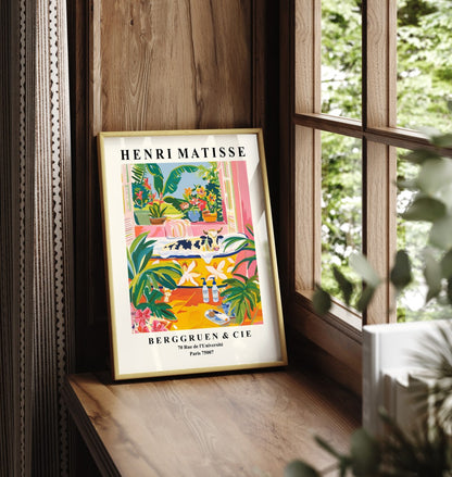 Framed wall art of cow in tub surrounded by flowers