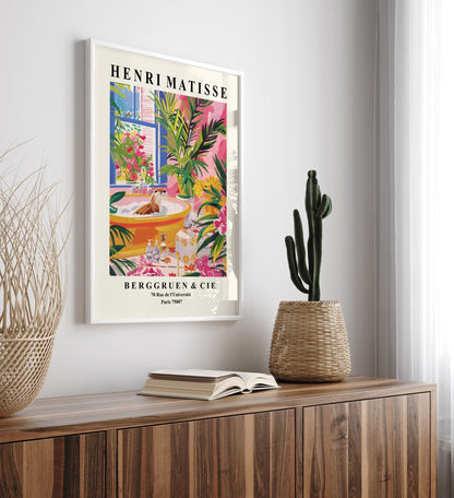 Framed Matisse style bathroom art print with an otter in a colorful, tropical setting.